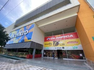 Shopping center entrance with advertisements. Valledupar, Colombia.